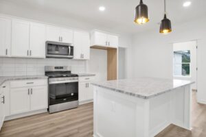 Discover modern living at 6001 Cooper Drive! This stunning Prime Design Home offers 3 beds, 2 baths, an office, and upscale finishes.